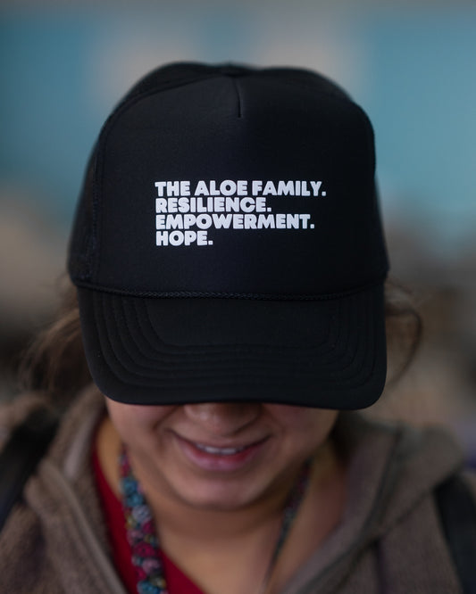 Resilience. Empowerment. Hope. Hat